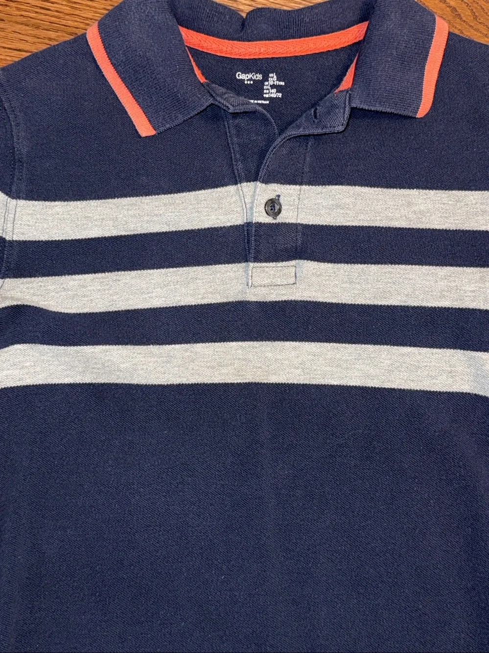 Size L/10 boys bundle of 2 Gap Kids short sleeve polo shirts.